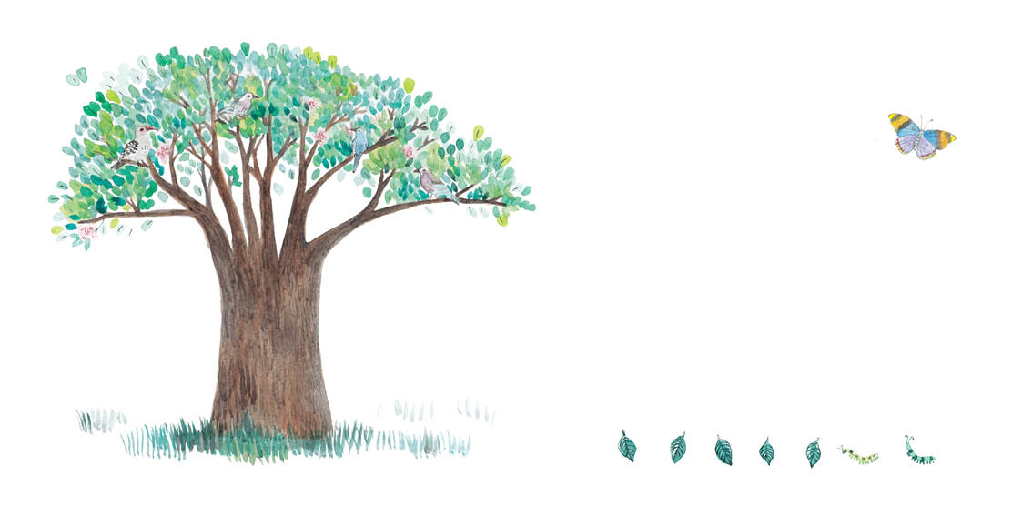 A beautiful old tree stands tall and proud in the field.