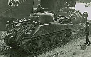 Shermans disembarking from LST at Anzio crop