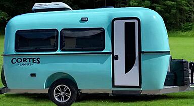 17 ft. Seafoam Green fiberglass hull lightweight camper trailer