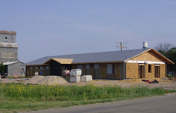 The Circle C Market in Cody, NE is being built with straw bales and mostly volunteer help on July 2, 2012. U.S. Departme