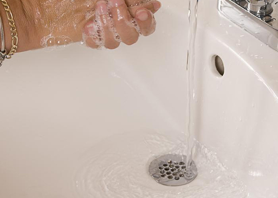 Handwashing over a sink. Amanda Mills, CDC photographer, 2011. Centers for Disease Control and Prevention, Public Health