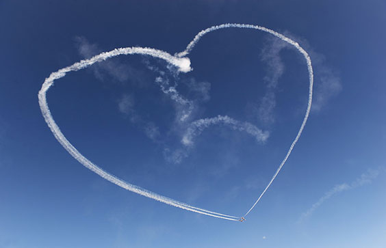 The U.S. Air Force Thunderbirds form a heart for deployed Airmen and their families during the 75th Anniversary Air Show
