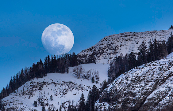 Waxing moon seen from Lamar Valley, Yellowstone National Park. Neal Herbert, photographer, 2015. National Park Service,