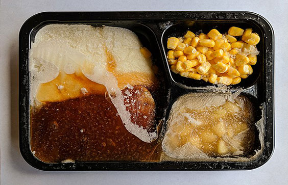 An opened, uncooked TV Dinner. Sir Beluga, photographer, March, 2018. Wikimedia Commons.