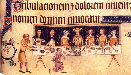 A 14th-century drawing of people eating. Scenes like this would have taken place in castles.