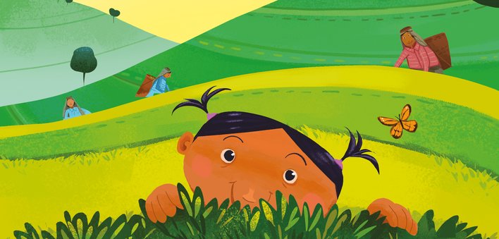 Girl peeping out of bushes in a tea garden