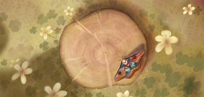 A tree trunk with leaves and flowers