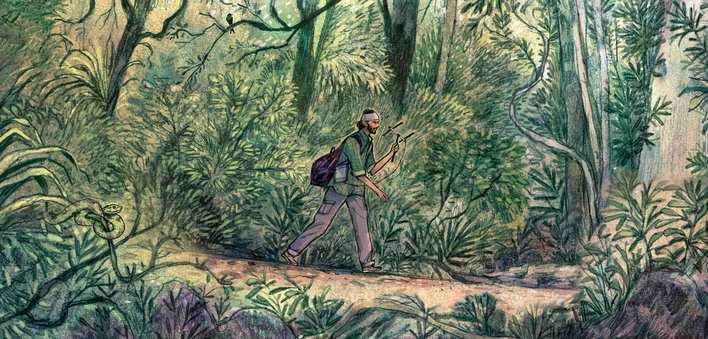 Ajay walking through the forest with an antenna in his hand