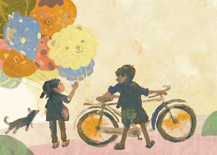 A child buying balloons