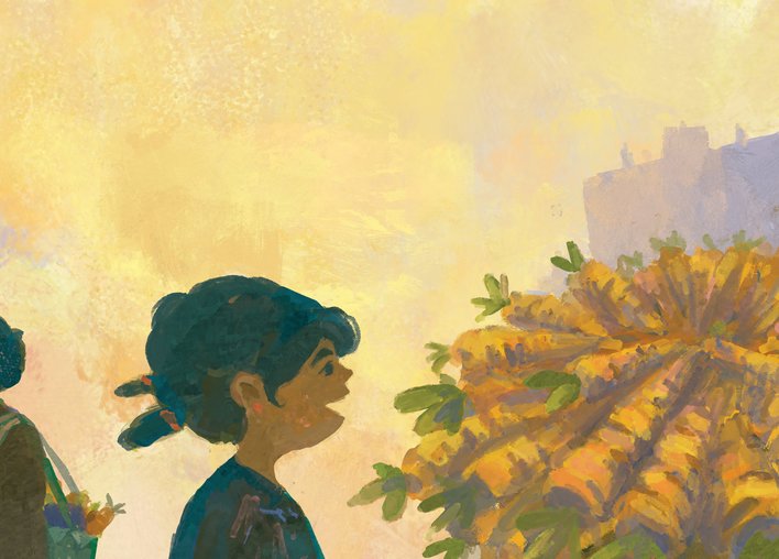 A child looking at carrots in the market