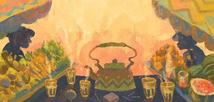 A kettle and tea glasses in a market