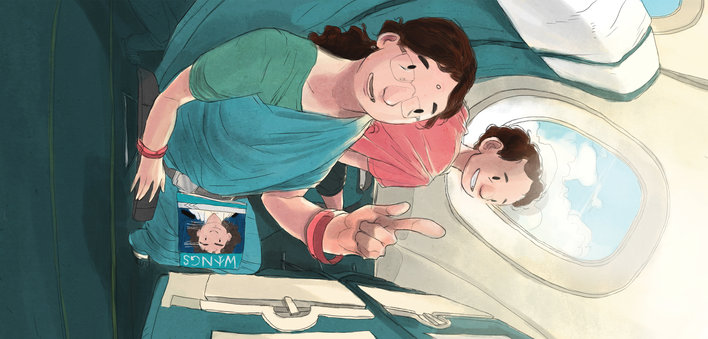 A woman and a boy on a flight