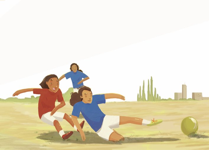 A group of girls playing football