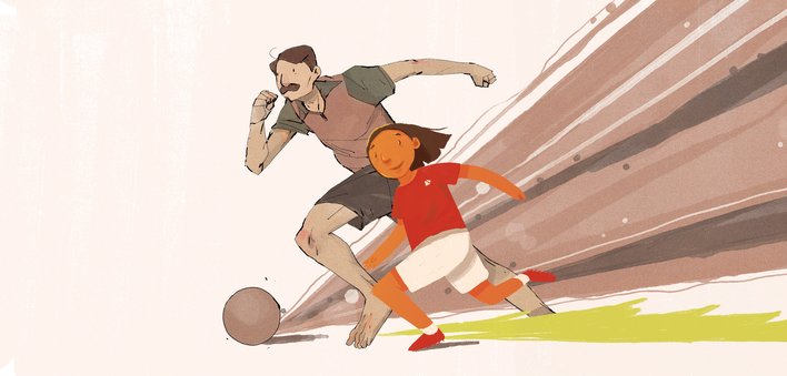 A man a a girl playing football