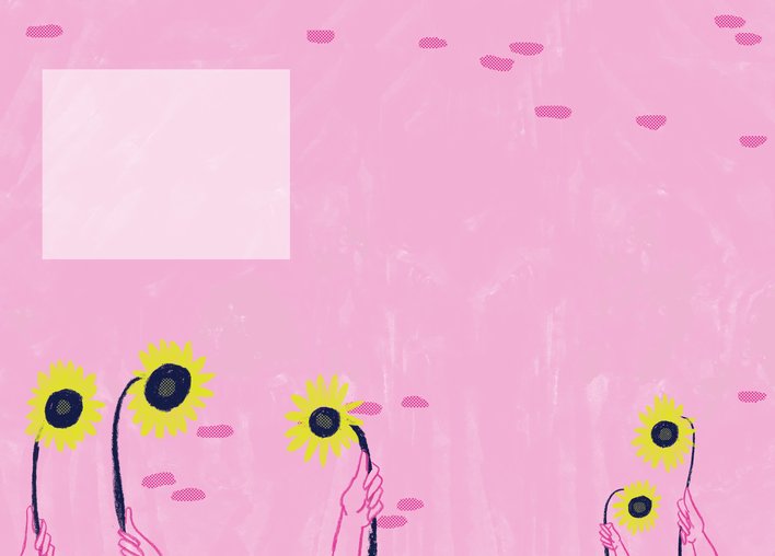 Hands holding up yellow flowers