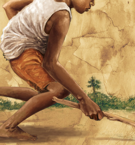 A boy playing with a stick