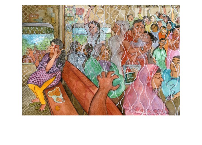 A view of crowded train compartment from the empty side