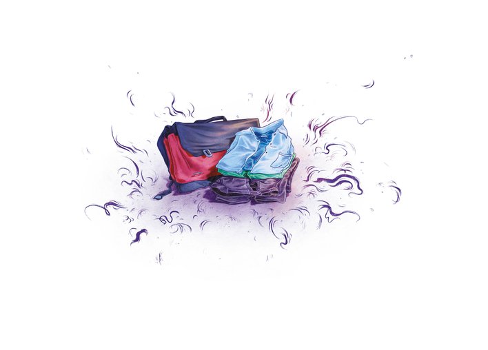 A school uniform placed next to a school bag