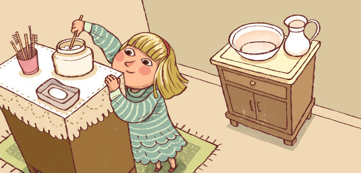 A girl dipping a stick into a jar