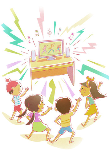 Children dancing watching a video on a computer