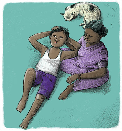 A boy lying on his mother's lap