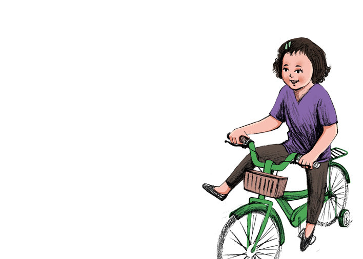 Girl trying to balance her cycle