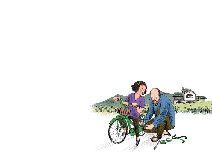 Grandfather helping girl repair her cycle