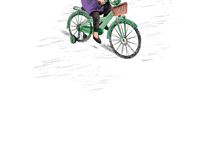 Girl riding her cycle with trainers
