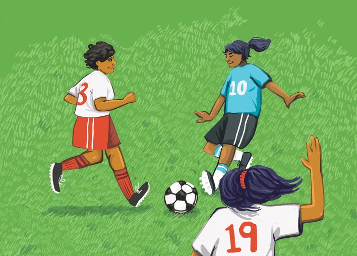 Girls playing football