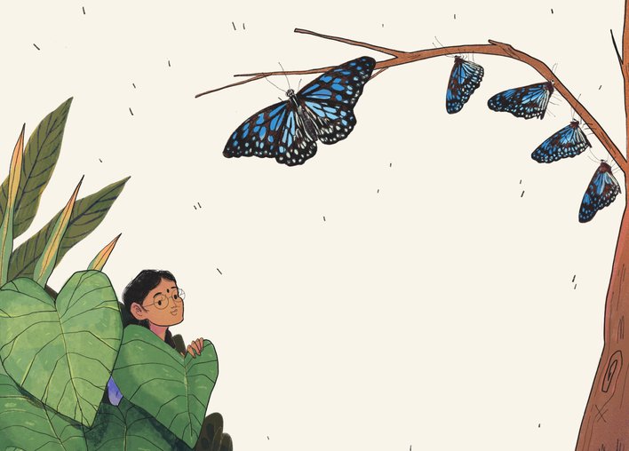 A woman looking at butterflies