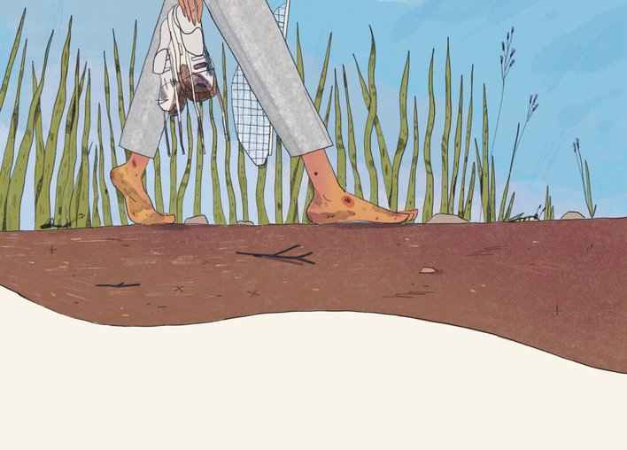 A view of barefoot legs walking in a jungle