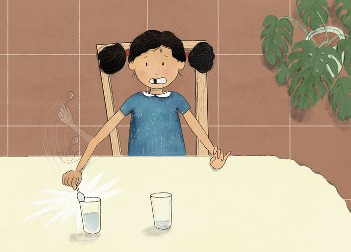Girl strikes a water-filled glass