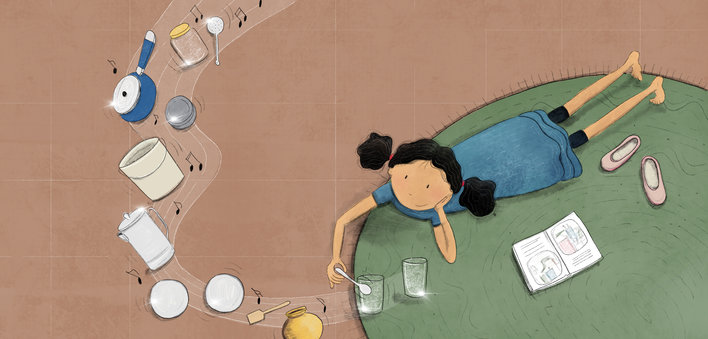 Girl resting on the floor surrounded with kitchen items