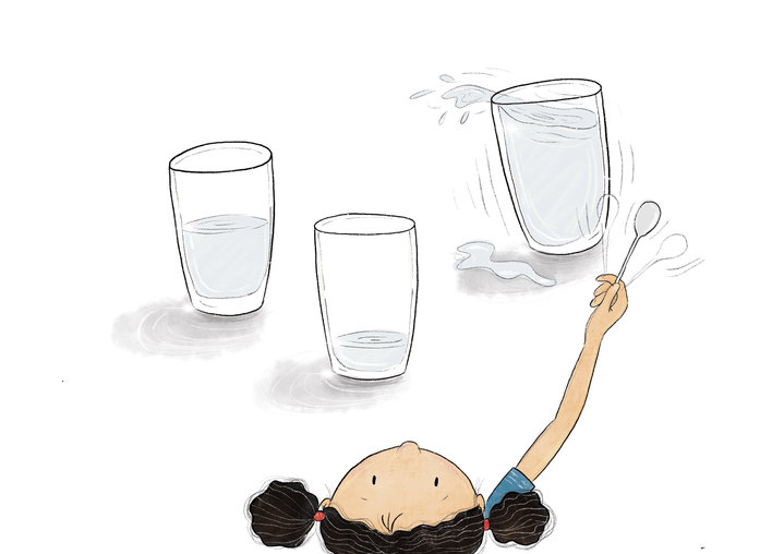 Girl hits three water-filled glasses