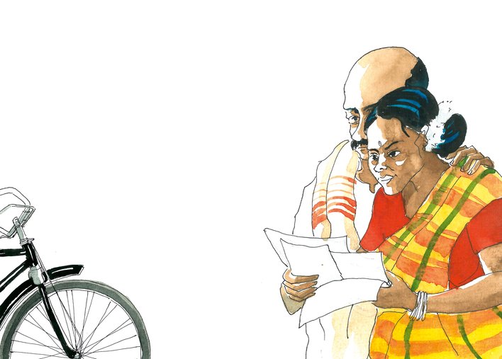 Two people reading a letter