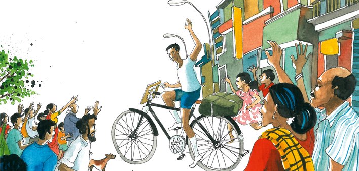 man on a cycle waving