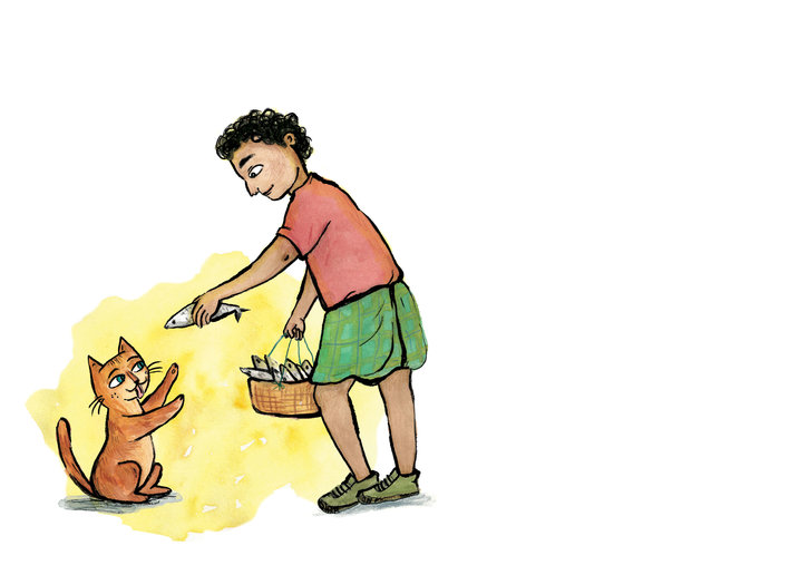 Man feeding a cat some fish