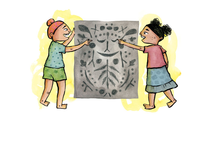 A Boy and girl are holding a chart paper