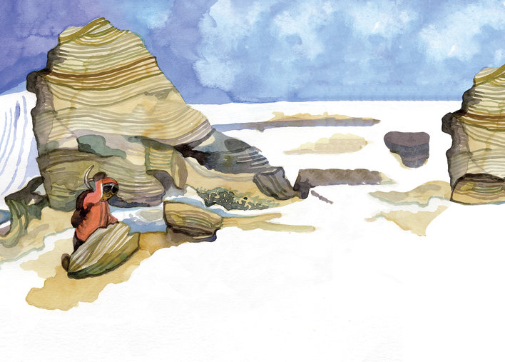 A woman hammering at a rock