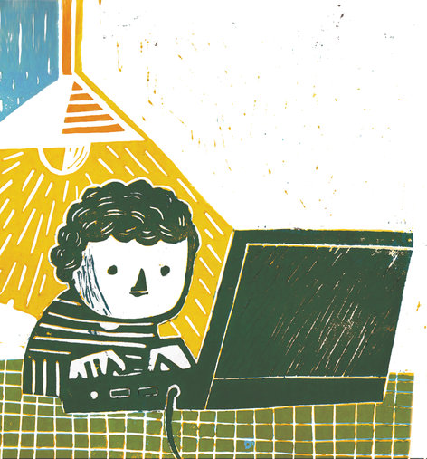 A boy working on a computer
