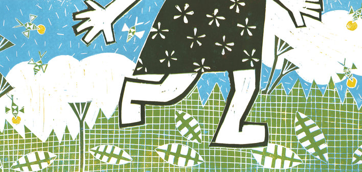 A girl running on grass