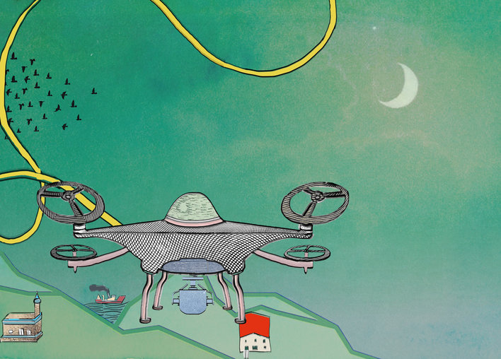 A drone flying over some hills