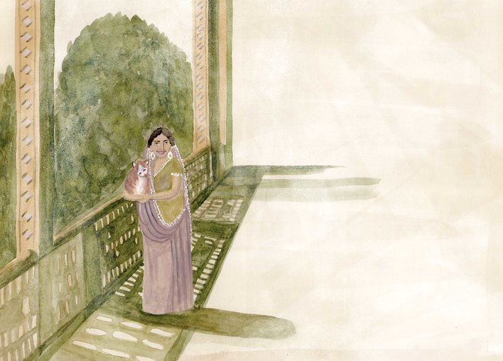 A woman holding a cat