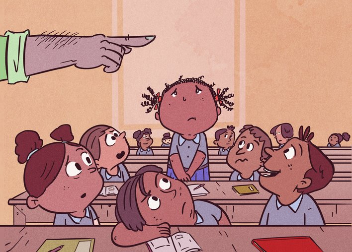 Student standing in a classroom