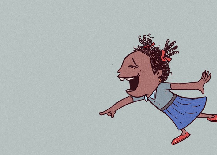 Girl laughing and pointing at something