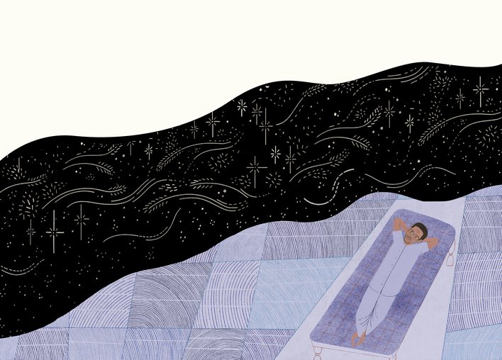 Dadaji Khobragade under the night sky looking at the stars