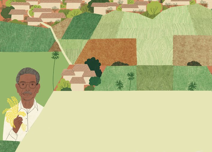 Dadaji Khobragade holding rice crop among vast green fields