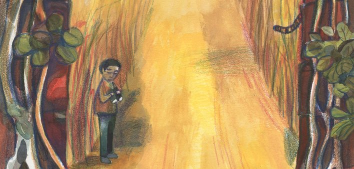 A man in the forest with binoculars