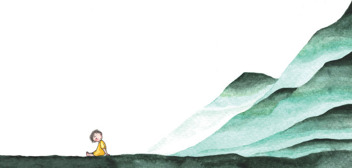 Girl looking at the mountains