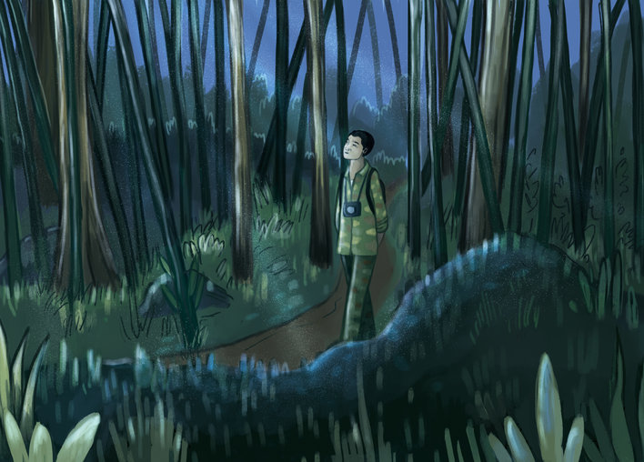 Man taking a stroll in the forest